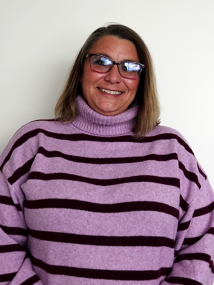 Administrative Assistant Jada Osterdyk in Office at Eide CDJR Pine City